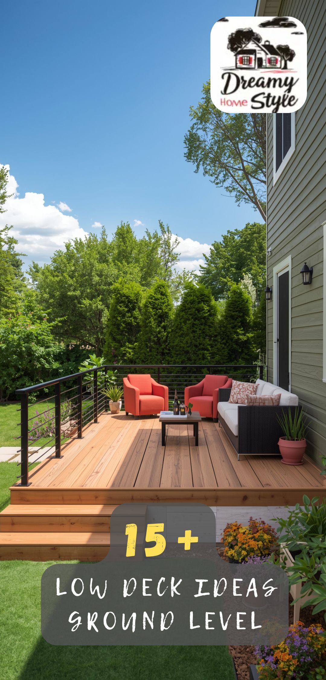 Low ground-level cedar wood deck with coral armchairs, wicker sofa, black horizontal railing, and lush backyard landscaping