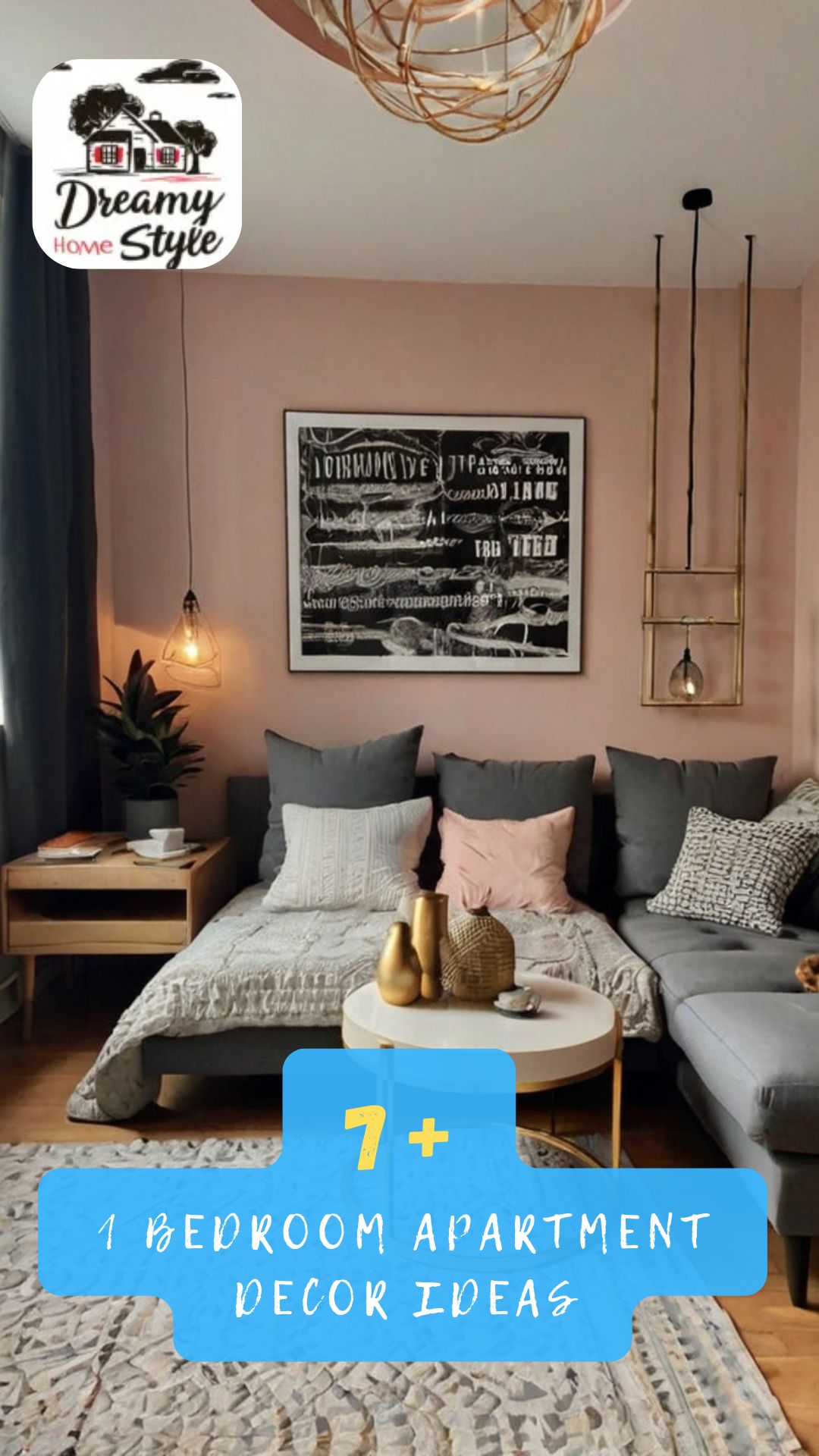 Cozy 1-bedroom apartment living space with pink walls, gray sectional sofa, gold decor accents, and warm pendant lighting