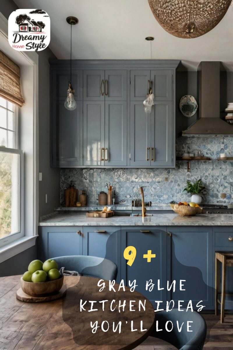 Gray blue kitchen with shaker cabinets, brass hardware, patterned tile backsplash, marble countertops, and pendant lights