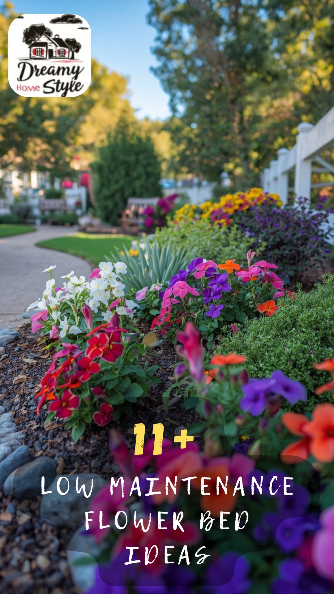 Colorful low maintenance flower bed with petunias, red, purple, yellow, and white blooms along a curved garden path