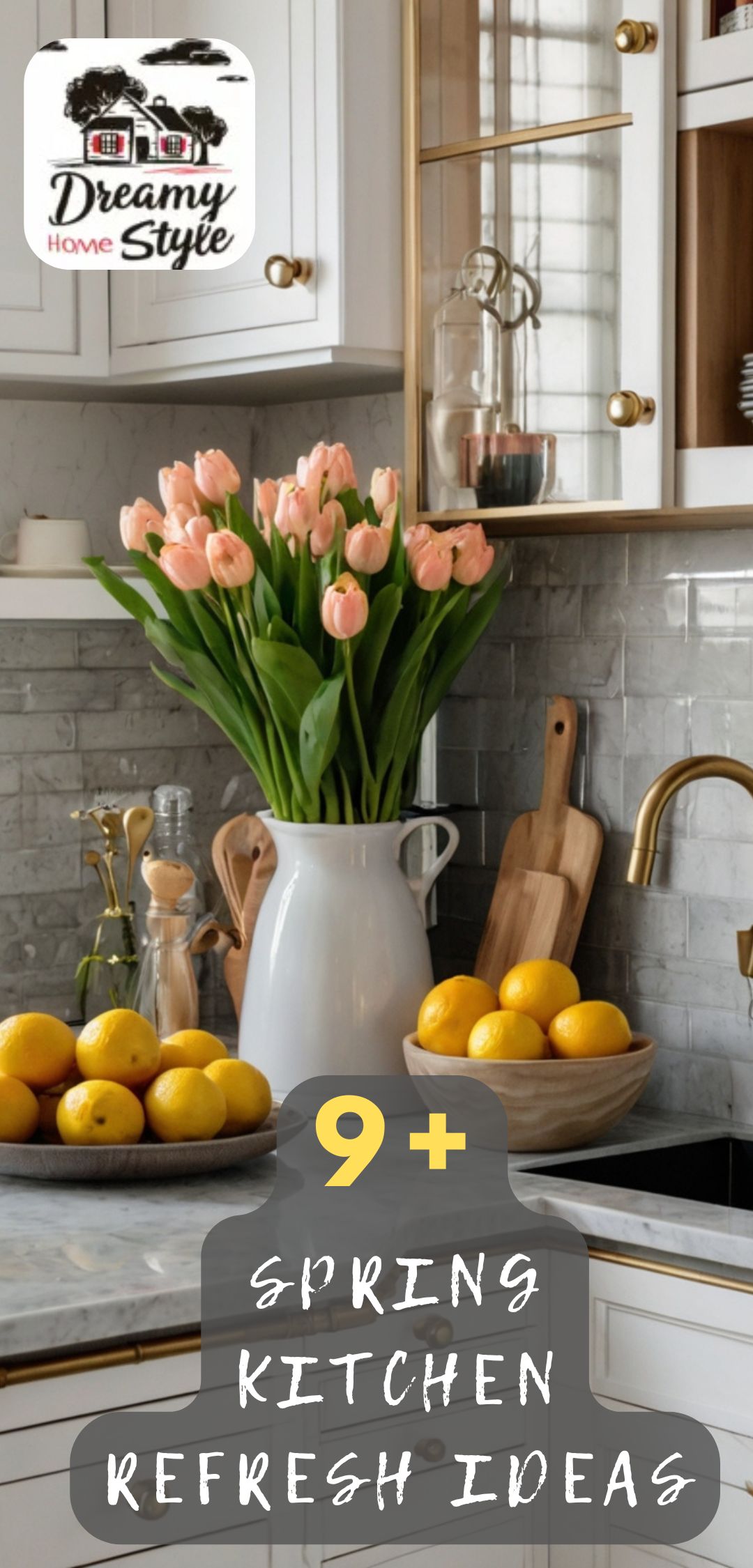 Spring kitchen counter with pink tulips in white pitcher, fresh lemons, wooden cutting board, and gold brass hardware